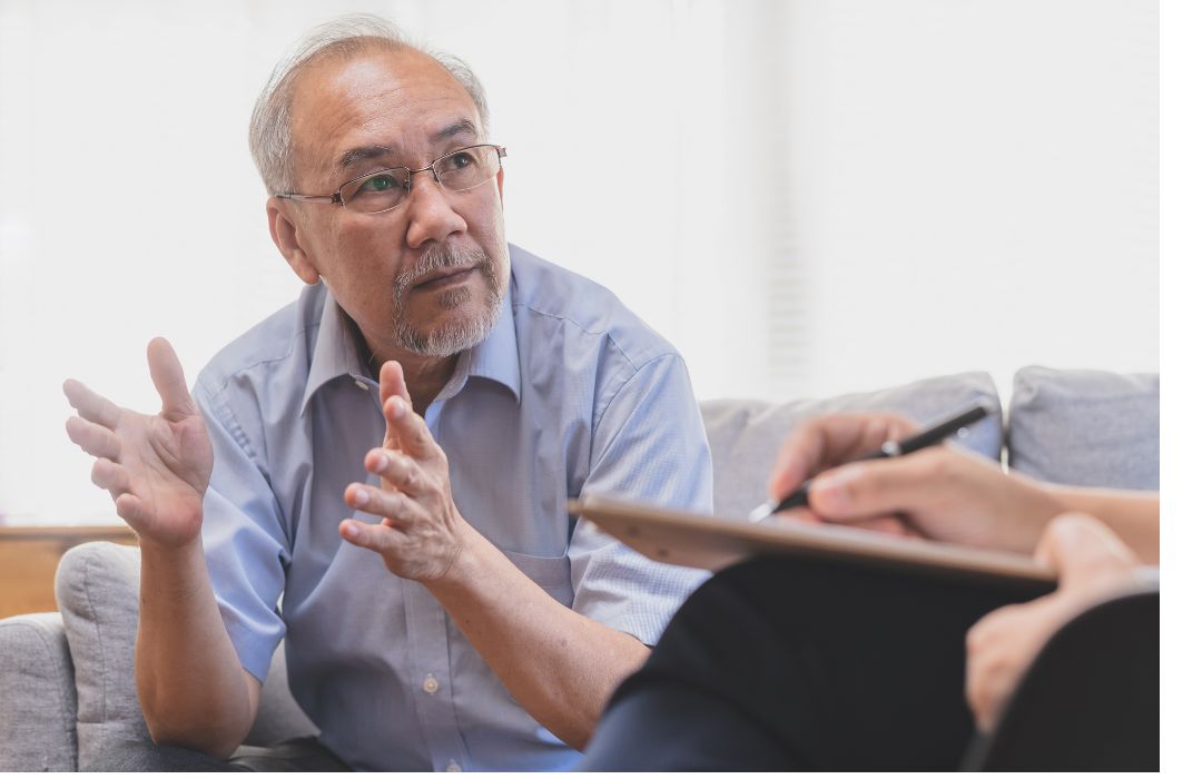 A man telling his history to his Christian therapist.
